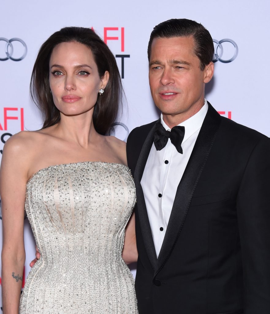 What Size Is Angelina Jolie Height Weight Physique More   Angelina Jolie With Brad Pitt 881x1024 